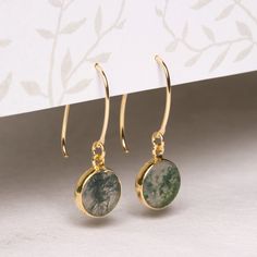 "Moss Agate Minimalist Gold Earrings - Unique, each one one-of-a-kind pattern authentic gemstone gold drop earrings for her, mom, wife, bff Stone: Genuine Moss Agate Bezel: Vermeil Gold Ear-wire: 14k Gold Filled Total length of earring: 35mm Circle Gemstone: 12mm diameter About \"Gold Filled Jewelry\": Also called rolled-gold. These jewelry items are not actually filled with gold. They are made of a base metal covered by sheets of gold in a mechanical bonding process. Effectively a thick coat of Minimalist Gold Earrings, Unique Wedding Earrings, Minimalist Earrings Gold, Agate Earrings, Agate Jewelry, Earrings Unique, Gold Drop Earrings, Gold Filled Jewelry, Moss Agate