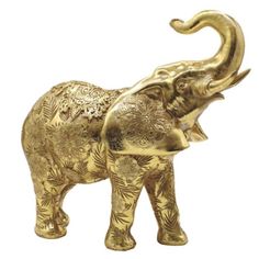 an elephant figurine is shown on a white background