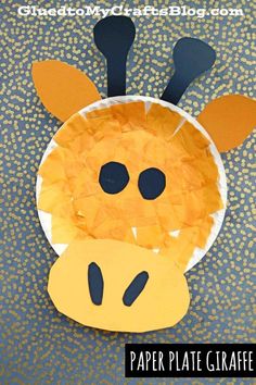 the paper plate giraffe craft is made with construction paper