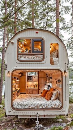 a tiny house built into the side of a tree