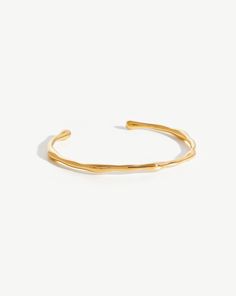 Molten Cuff Bracelet | 18ct Gold Plated. A Subtle Addition to Your Arm Stack. Designed to Reflect the Texture of Molten Rock, this Open Cuff Design Looks Great Worn on Its Own, or Paired with Your Favorite Chunky Chain Bracelet. Metal: 18K Gold Plated on Brass Size: S/M Fit Guidance – Fits Wrist Up to 155mm Outer Dimensions: H: 42mm W: 3. 5mm Diameter: 58mm Opening Gap: 30mm Weight: 6. 7g Product Code: Gm-G-B4-Ns Everyday Bracelets, Arm Stack, Finger Bracelets, Double Chain Necklace, Malachite Necklace, Cuff Design, Gold And Silver Bracelets, Bracelet Metal, Leaf Bracelet