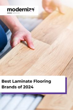 the best laminate flooring brands of 2012 - modernizing magazine cover image with hands on wood planks