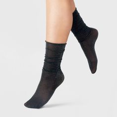 Elevate your everyday looks with the 2-Pack of Sheer Sparkle and Solid Sheer Rolltop Slouch Anklet Socks from A New Day™. These two pairs of black anklet socks feature a sheer construction with metallic accents for an eye-catching look, pairing easily with your outfits. Plus, these lightweight socks are made from soft and stretchy fabric for comfortable wear. A New Day™: Style that goes wherever you do. Black Anklet, Sheer Socks, Sock Packs, Sock Shop, Athletic Socks, Socks And Hosiery, Metallic Accents, Sheer Fabrics, A New Day