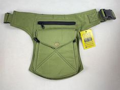 Waist bag/Shoulder bag/Pallet bag. Unisex and adjustable belt. 5 pockets in total: -3 front pockets closed with zippers. -1 back pocket closed with zipper. -1 small "secret" pocket on the side of the fanny pack, closed with velcro. Size approx. waist bag: 22cm wide * 27cm high. Size approx. Top bag: 15cm * 23cm high. Size approx. Front bag: 16cm wide * 18cm high. Size approx. inner bag: 11cm wide * 15cm high. Size approx. back bag: 18cm wide * 24cm high. Minimum belt length (including shoulder s Multifunctional Crossbody Belt Bag With Pockets, Khaki Shoulder Chest Bag With Pockets, Casual Khaki Belt Bag With Pockets, Pouch Belt Bag With Pockets For School, Multifunctional Rectangular Belt Bag With Pockets, School Belt Bag Pouch With Pockets, School Pouch Belt Bag With Pockets, School Belt Bag With Pockets And Pouch Shape, Functional Green Chest Bag With Pockets