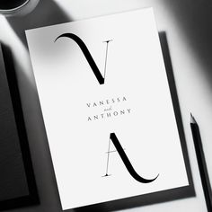 an image of a business card with the letter y in black and white on it