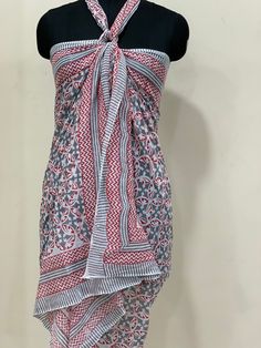 "Colorful, woodblock printed, cotton sarong, perfect for a day by the shore or to lounge in comfort at home. Wrap it in a variety of ways, as a beach dress (see photo), or around the waist, or simply use it to lie on at the beach. A versatile addition to any wardrobe! Measures 44\" x 72\"(180cm x110cm ) *Made of 100% cotton. *Hand Block printed *Machine wash on warm/cold *Production Capacity: 1000 Naturally occurring dye variations are found on all hand printed textiles, making each piece unique Summer Beachwear Sarong With Block Print, Cotton Block Print Sarong For Beach, Multicolor Block Print Beachwear Sarong, Multicolor Cotton Block Print Sarong, Block Print Scarf, Multicolor Block Print Sarong For Beach Cover-up, Hand Printed Textiles, Cotton Bedsheets, Indian Block Print