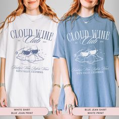 two women wearing t - shirts that say cloud wine and blue jean print