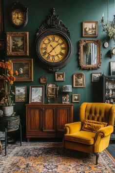 a living room with green walls and pictures on the wall next to a yellow chair