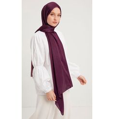 Shine Hijab Shawl - Dark Plum Glossy in texture and elegant in appearance, our shine shawl is set to be the next great addition to your wardrobe! Its sleek shine makes for an impressive final touch to formal wear so you could look and feel your best on any special occasion. FEATURES: - Glossy finish - Suitable for all seasons - Opaque (not transparent) MATERIAL: - 75 cm x 185 cm - Polyester CARE: - Hand wash separately in cold water. - Lay flat to dry. - Iron on low without steam. Made in Turkey Elegant Shawl For Eid And Formal Occasions, Elegant Shawl For Formal Eid Occasions, Elegant Formal Shawl For Eid, Elegant Pashmina Shawl For Eid, Elegant Wedding Hijab, Elegant Purple Dupatta For Eid, Elegant Formal Shawl In Solid Color, Luxury Solid Shawl, Elegant Eid Pashmina Shawl