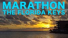 the sun is setting over water with clouds in the background and words marathon the florida keys