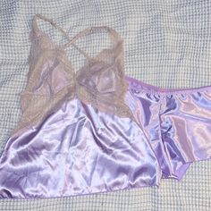 Never Worn! Measurements: Shorts Waist : 15” Rise 9.5” Inseam 1.5” Top Underbust: 14” Purple Camisole Sleepwear For Bedtime, Purple Camisole Sleepwear For Loungewear, Purple Camisole Sleepwear For Night, Purple Lace Trim Party Sleepwear, Purple Camisole For Sleepover, Purple Camisole Loungewear, Fitted Purple Sleepwear For Pajama Party, Purple Sleepwear With Lace Trim For Night, Purple Lace Trim Sleepwear For Night