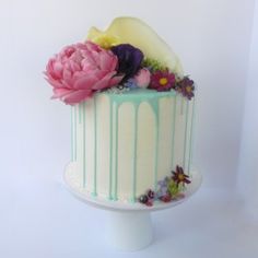 there is a cake with flowers on it