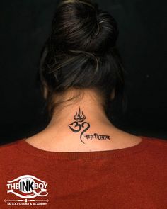 a woman with a tattoo on her neck