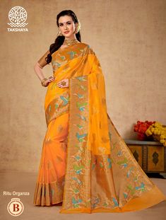 Product Name = Designer Organza Women's Saree Color - Orange Length - 6.30  Meter Contains - blouse piece incluced  Fabric - Organza  Care Instruction - Dry clean Note - Please contact us for any query . Bohemian Art Silk Blouse For Eid, Festive Bohemian Blouse With Zari Weaving, Orange Blouse With Zari Weaving For Festivals, Orange Blouse With Zari Weaving For Diwali, Orange Zari Weaving Blouse For Diwali, Orange Semi-stitched Bohemian Traditional Wear, Fitted Bohemian Blouse Piece With Zari Weaving, Bohemian Art Silk Blouse For Puja, Bohemian Chanderi Choli With Self Design