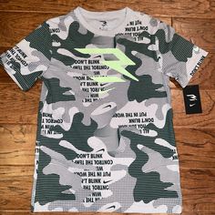 Brand New With Tags. Nike Green Graphic Print T-shirt, Nike Green T-shirt With Graphic Print, Nike Green Tops With Graphic Print, Nike Green Tops With Logo Print, Nike Green Top With Logo Print, Sporty Printed Cotton T-shirt, Russell Wilson, Kids Nike, Nike Shirts