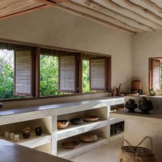 the kitchen is clean and ready for us to use it's natural wood accents