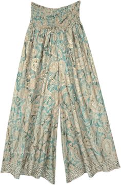 Abstract floral and paisley prints on wide-leg pants which are soft and flowy, and have a smocked waist.  The loose-fit wide-leg printed rayon pants have a comfortable waist that will fit a small to a large. #tlb #SplitSkirtsPants #beachwrap #Printed #bohemianfashion #festivalpants Indie Pants, Long Cotton Skirt, Flowy Wide Leg Pants, Green Clothing, Festival Pants, Christmas Clothes, Hippie Look, Trendy Skirts, Pants Green