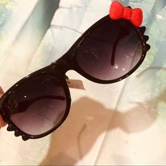 Brand New Cute Red Sunglasses With Uv Protection, Fun Black Sunglasses With Glass Lenses, Fun Black Glass Sunglasses, Cute Red Party Sunglasses, Cute Black Sunglasses With Uv Protection, Playful Black Plastic Sunglasses, Hello Kitty Sunglasses, Black Hello Kitty, Colored Sunglasses