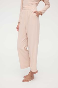 These Cotton Cozy Lounge Pants are an understated sleep style with a loose fit that make them extra comfy to toss, turn, and snooze in. Tailored in a luxuriously soft blend of cotton and TENCEL™ Modal. Details Materials & Care Shipping & Returns • Features an elastic waistband, pockets, cropped legs that fall just above the ankle, and a relaxed yet feminine fit. • Complete the set: this top pairs perfectly with our Cotton Cozy Long Sleeve Shirt. Size M is 37.0" in length.• Made from a premium bl Cozy Spring Pants For Relaxation, Cozy Spring Relaxation Pants, Relaxed Fit Bottoms With Elastic Cuffs For Loungewear, Solid Sleep Pants With Elastic Waistband, Solid Pants With Elastic Waistband For Sleep, Comfy Loungewear Pants With Elastic Cuffs, Comfortable Loungewear Pants With Elastic Cuffs, Comfy Lounge Pants With Elastic Cuffs, Solid Color Wide Leg Sleepwear For Relaxation