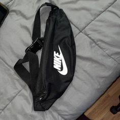 Looks Brand New And In Great Condition Casual Black Shoulder Bag, Casual Black Bag For School, Casual Black School Bag, Black Nike Bag With Adjustable Strap, Nike Black Bags For Everyday, Everyday Black Nike Bag, Nike Black Everyday Bags, Casual Black Pouch Bag, Nike Black Bag With Zipper Closure