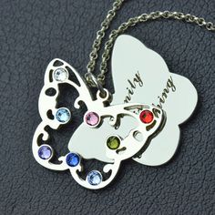 Celebrate your love for mom with this gorgeous sterling silver family butterfly birthstone necklace. The shape of butterfly is the symbol of change, this makes an especially memorable gift for a new mom or grandma. Stainless Steel Butterfly Necklace Gift, Mother's Day Butterfly Jewelry With Butterfly Charm, Mother's Day Jewelry With Butterfly Charm, Mother's Day Butterfly Charm Jewelry, Butterfly Shape Birthstone Jewelry For Anniversary, Butterfly Shaped Birthstone Jewelry For Anniversary, Mother's Day Butterfly Charm Pendant Necklace, Mother's Day Jewelry Pendant With Butterfly Charm, Mother's Day Jewelry With Butterfly Pendant