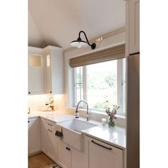 the kitchen is clean and ready for us to use in its new owner's home