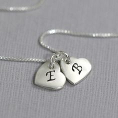 "Hand Stamped Double Heart Initial Charm on Sterling Silver Necklace Chain Please see second photo for size reference Necklace Length:  Available in difference sizes.  Please select length preference from drop down list Comes beautifully gift packaged.  If you want the item packaged with a message card, please note your message in the \"add your personalization box\" or in the \"notes to seller\" box at the card page MORE FROM ALEXANDREASJEWELS: https://www.etsy.com/shop/alexandreasjewels Shippi Heart Initial Necklace, Necklace Girlfriend, Valentines Gift For Her, Bridal Party Jewelry, Sterling Silver Heart Necklace, Necklace Heart, Sterling Silver Chain Necklace, Silver Heart Necklace, Valentines Gifts For Her