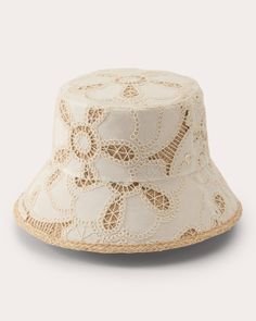 a white hat with lace on it