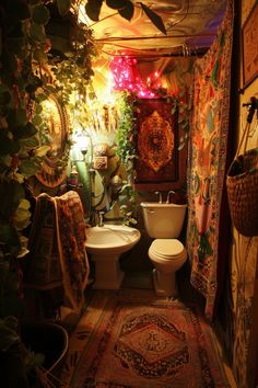 a bathroom decorated in bohemian style with rugs and lights on the ceiling, toilet and sink