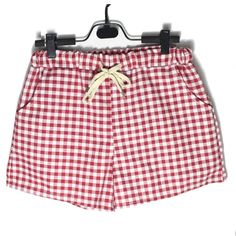 Designed for maximum comfort, this summer women's shorts is crafted from soft cotton and features an elastic waistband for affording a secure and adjustable fit. The lightweight plaid fabric construction ensures breathability and lightweight step every time. Summer Beach Shorts, Womens Summer Shorts, Pants Summer, Polyester Pants, Linen Casual, Shorts For Women, Plaid Fabric, Loose Shorts, Loose Pants