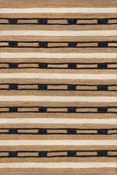 an area rug with black and beige stripes