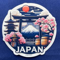 the japan sticker is displayed on a blue surface with cherry blossom trees and mountains in the background