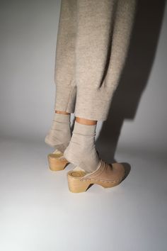 Slipper meet clog, clog meet slipper. Mid heel clog with sheepskin upper. Perfect for when the weather starts to get cold. We love this for indoors and outdoors. Fawn suede is a light tan suede with off-white shearling. Please note: This style has a low instep, initial fit may be snug. Upper will stretch and give with wear. Every clog is handmade. Certain styles may take up to 10 business days to arrive. DETAILS Sheepskin and cow leather upper. Wood base with polyurethane sole. 2.5" heel with 1" Shearling Clogs, Clogs Outfit, No 6, Clog Heels, Light Tan, Tan Suede, Mid Heel, Cool Patterns, Cow Leather