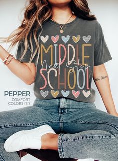 "Fifth Grade Graduation Shirt, Next Stop Middle School Tshirt, End of 5th Grade Teacher Summer T-Shirt, Elementary School Graduation Team Tee HOW TO ORDER ➀ Select color ➁ Select the size (Please check size chart) ✦ True to size. Size up 1-2 sizes for an oversized look. ➂ Add to cart ✦ (Optional) \"Add message to Seller\" on the checkout page. GARMENT FEATURES ✦ Crew neckline ✦ Direct to garment printing - no vinyl, decal, or iron-on technique ✦ Our designs are printed on the garment to last a l End Of School Year Slogan T-shirt With Crew Neck, Multicolor Crew Neck Tops For College, End Of School Year Graphic Tee With Letter Print, Multicolor School Spirit T-shirt With Text Print, End Of School Year Slogan Crew Neck Top, School Spirit Slogan Top With Relaxed Fit, School Spirit Slogan Top In Relaxed Fit, College Multicolor Graphic Print T-shirt, Multicolor Text Print T-shirt For School Spirit