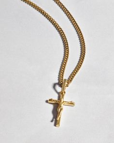 Choose the pendant that best expresses your faith. The yellow gold Crucifix Pendant is one of the newest additions to our men’s pendant collection and a best-seller. We’ve crafted this gold crucifix pendant with the best gold jewelry materials to create a standout shine and be comfortable as it remains close to your heart. Pair this 14k yellow gold-finished men’s crucifix pendant with a JAXXON gold chain to build your own gold crucifix necklace—an accessory you’ll never want to take off. Showcase your faith and add this gold crucifix necklace to your gold jewelry collection today. Gold Crucifix Necklace, Gold Jewelry Collection, Gold Cuban Link Chain, Jewelry Materials, Crucifix Necklace, Gold Rope Chains, Solid Gold Chains, Silver Shop, Cuban Link Chain