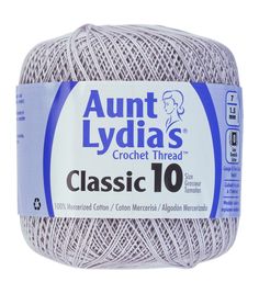 a ball of white yarn with the words classic 10 on it in blue and white