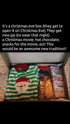 an open box filled with christmas items on top of a carpet