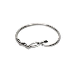 Gorgeous wrapped snake bangle with a smooth polished finish. These look amazing stacked together! Available in sterling silver or brass. - Bangle measures 2 1/2" across Modern Twist Silver Bracelets, Elegant Nickel-free Metal Stackable Rings, Elegant Spiral Hand Wrapped Jewelry, Silver Bracelets With Polished Finish And Modern Twist, Adjustable Cuff Bracelet With Polished Finish, Silver Bracelets With A Modern Twist, Silver Bracelet With Polished Finish And Modern Twist, Modern Hand Forged Bangle Jewelry, Elegant Hand Forged Bangle