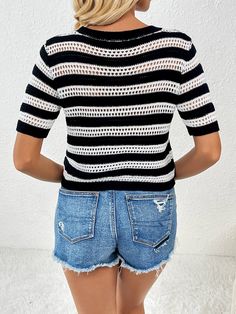 Get ready to turn heads with our Joanna Striped Short Sleeve Top - now available in stunning black white stripe! This playful top features bold stripes and comfortable short sleeves, making it perfect for any occasion. Make a statement and express your unique style with this quirky and fun piece. (And trust us, it's so comfy you won't want to take it off!) Order now and add some fun to your wardrobe! Size Guide: Model is 5’6” tall, and has a 32.4” bust, 24.2”waist, & 35.2” hips. She is wearing a S / US 4 / AU 8. This top is true to size. Material: 100% Acrylic. Key Features: Crew neckline. Short sleeves. Perforated striped. Soft lightweight knit fabric. Relax Fit. Not lined. Care Instructions: Machine wash / Cold hand wash Chic Striped Crew Neck T-shirt, Chic Striped T-shirt For Summer, Fitted Black Top With Contrast Stripes, Black Fitted Top With Contrast Stripes, Black Horizontal Stripe Top For Spring, Black Horizontal Stripe Spring Tops, Chic Summer Tops With Striped Collar, Chic White Top With Horizontal Stripes, Striped Sleeve Tops For Summer Day Out