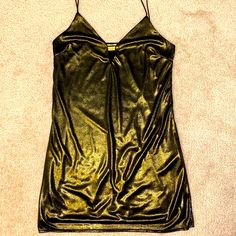 Sexy Shimmering Slip Dress Color: Dark Gold Sheer Fabric On Top Black Slip Underneath Plunging Neckline With Strap Across Shaping Darts At Chest Spaghetti Straps Are Fixed Length But Could Be Lengthened Measurements Lying Flat: Chest 16.5” Length From Under Arm 24” 100% Polyester- Hand Wash Or Dry Clean Nwt Never Worn Gold Spaghetti Strap Bodycon Dress For Night Out, Gold V-neck Bodycon Dress For Night Out, Gold Mini Dress For Going Out, Gold V-neck Mini Dress For Night Out, Gold Bodycon Mini Dress For Date Night, Gold Glamorous Mini Dress For Going Out, Glamorous Gold Mini Dress For Going Out, Dark Gold, Sheer Fabric