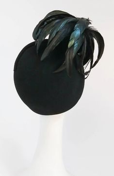 For Sale on 1stDibs - 1980s Mr. John Rooster Feather Hat. A spray of feathers articulate this elegant black wool hat. Elegant Black Costume Hat With Feather Trim, Elegant Black Feather Trim Costume Hat, Black Feathered Hats For Kentucky Derby, Black Feathered Costume Hats For Kentucky Derby, Black Mini Hats With Feather Trim For Kentucky Derby, Kentucky Derby Black Feathered Costume Hats, Black Feather Trim Mini Hats For Kentucky Derby, Black Feathered Hats And Headpieces For Kentucky Derby, Black Mini Hat With Feather Trim For Royal Ascot