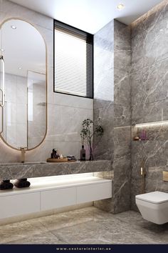 a modern bathroom with marble walls and flooring