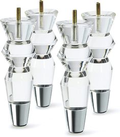 a set of seven glass vases with gold screws