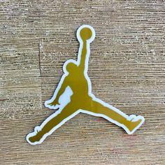 Brand New, Unused Nike Air Michael Jordan Vinyl Decal Sticker. Peel-And-Stick Back. Metallic Gold With White Outline. See Photos For Measurements. Nike Stickers, Air Jordan Logo, Jordan Logo, Nike Gold, Nike Wallpaper, Logo Sticker, Michael Jordan, Nike Air Jordan, Metallic Gold