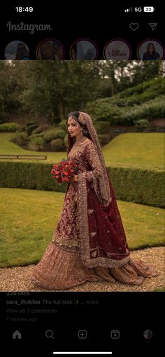 a woman in a red and gold wedding dress