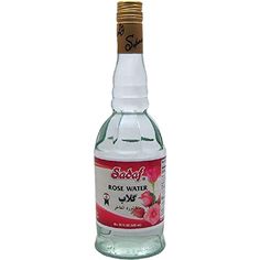 a bottle of rose water is shown on a white background with the word stead written in arabic