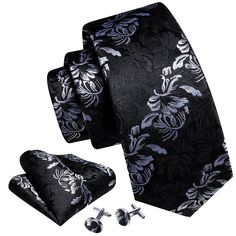 This Black White Floral Silk Tie Pocket Square Cufflink Set is the perfect addition to any formal wear ensemble. Made with high quality silk, this tie features a sophisticated black and white floral pattern that will make a statement at any wedding or special occasion. The set also includes a matching pocket square and cufflinks for a polished, put-together look. 100% Silk Handmade Package Includes: Tie, Pocket Square & Cufflinks. Length: 59" Width: 3.34" Warm iron if needed Cufflink Set, Tie Set, Tie And Pocket Square, Silk Ties, Pocket Square, Gift Item, Black Silver, Neck Tie, Cufflinks