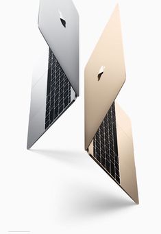 two apple laptops side by side, one is gold and the other is silver