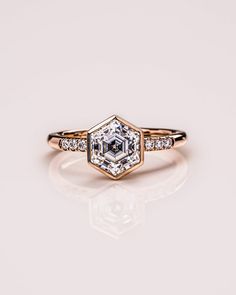 an engagement ring with a diamond in the center