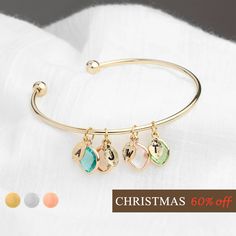 "Birthstone Bracelet For Mom * Personalized Jewelry for Mom * Grandma Gift * Bridesmaid Bracelet * Birthstone Jewelry Bridesmaid One of our new favorites! This birthstone bangle can be customized with a birthstone and initialed leaf to create a jewelry piece that is both stunning and personal. The sentimental elements make this piece a great gift option for bridesmaids, grandmothers, and mothers alike! You can even add multiple stones and leaves for a look that is truly unique. Each item is made Birthstone Keychain, Bracelet For Mom, Mom Jewelry Personalized, Personalized Charm Necklace, Christmas Gifts For Grandma, Bar Necklace Personalized, Birthstone Bracelet, Bridesmaid Bracelet, Grandma Gift